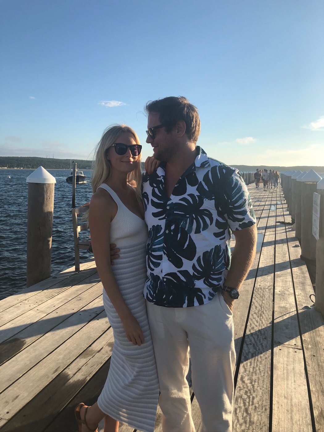 Phoebe and Chris on a Hamptons dock at golden hour