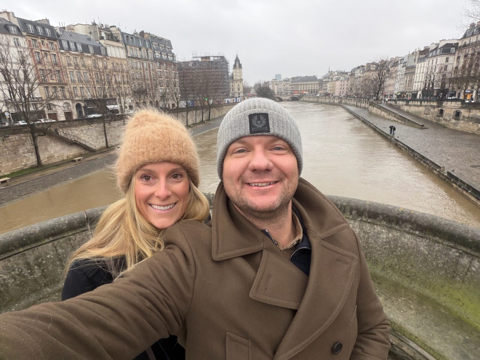 Phoebe and Chris on a bridge over the Seine in Paris