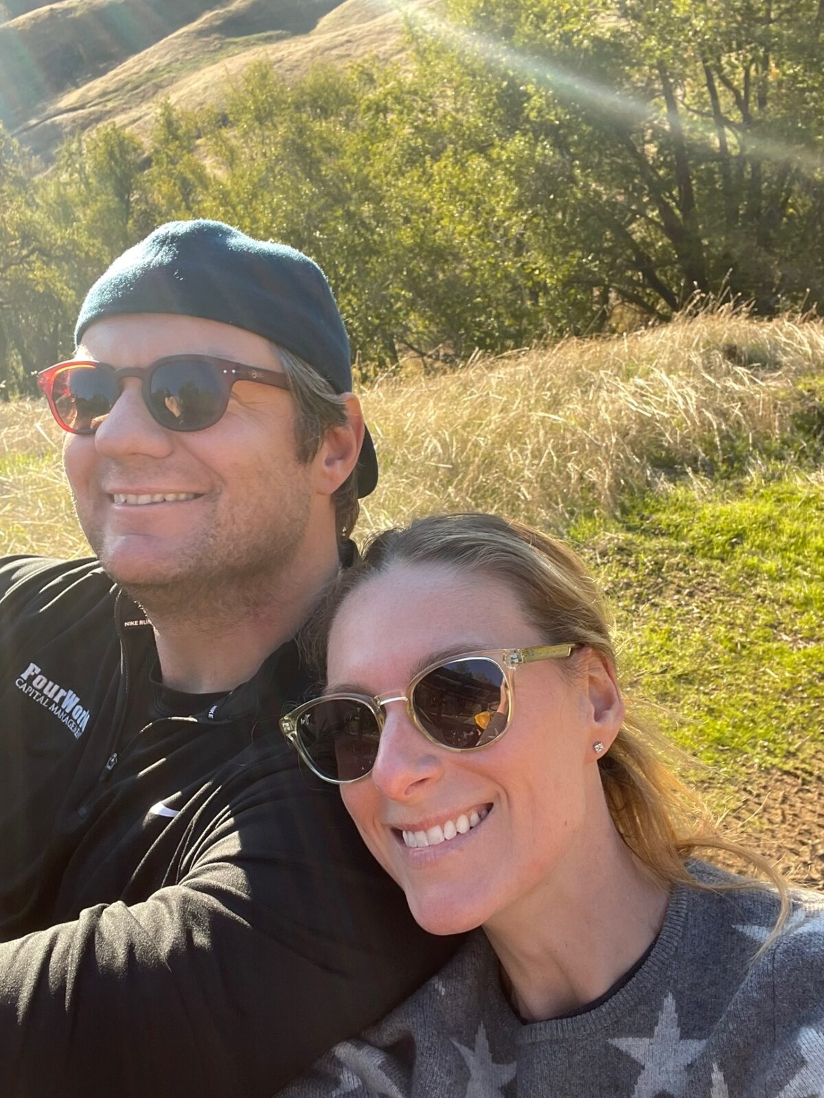 Phoebe and Chris in golden autumn hills